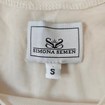 Pink satin blouse by Simona Semen